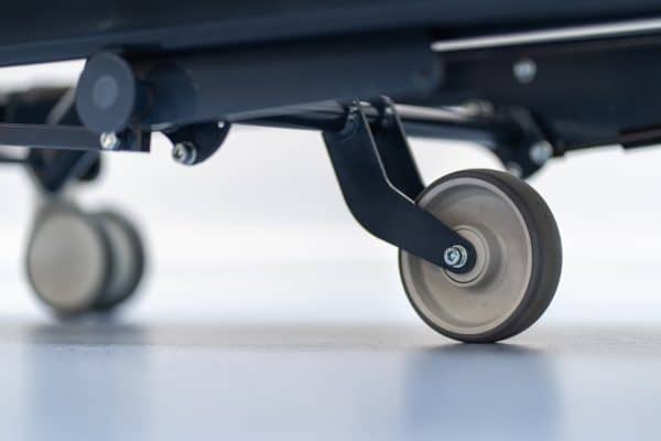 Close up image of 5th wheel on MultiFlow Ultra Low X-Ray Hospital Patient Stretcher
