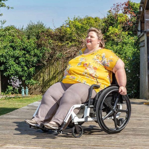 Lady sitting in Invacare Action Ampla Bariatric Wheelchair